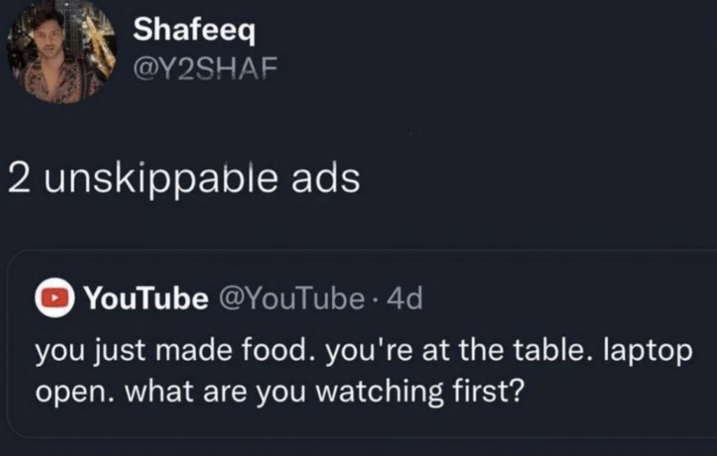 Screenshot of a Twitter post. The original tweet by Shafeeq (@Y2SHAF) says "2 unskippable ads". The retweeted post from YouTube (@YouTube) states, "you just made food. you're at the table. laptop open. what are you watching first?".