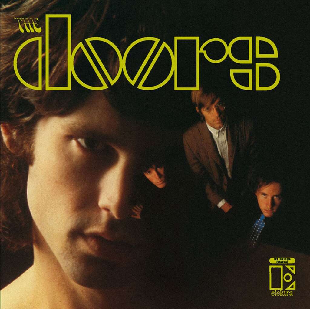 Album cover for "The Doors" by the band The Doors. The cover features dark, moody lighting with a close-up of one band member's face in the foreground and the other three band members in the background. The band name is written in stylized yellow text at the top.