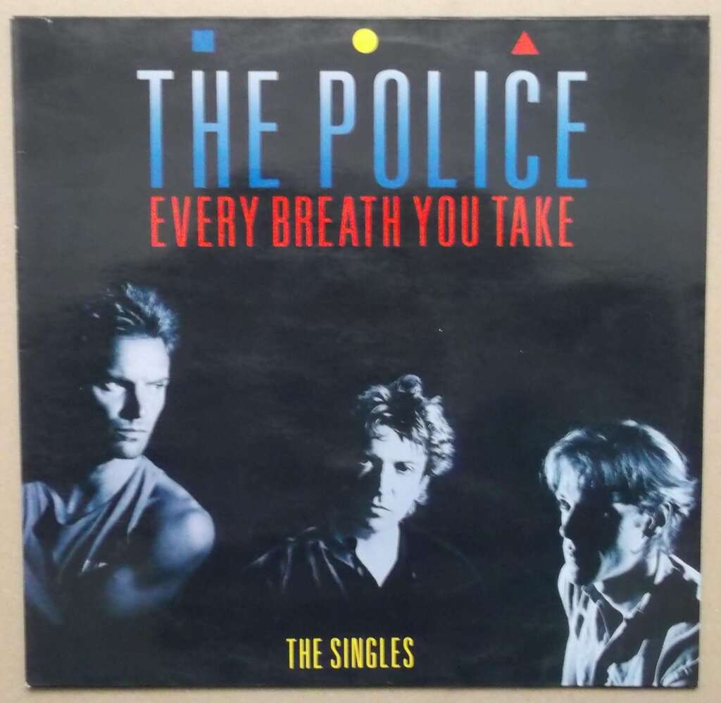 Album cover of "Every Breath You Take: The Singles" by The Police. The cover features a group photo of the three band members in black and white, with the album title and band name in colorful uppercase letters above them.