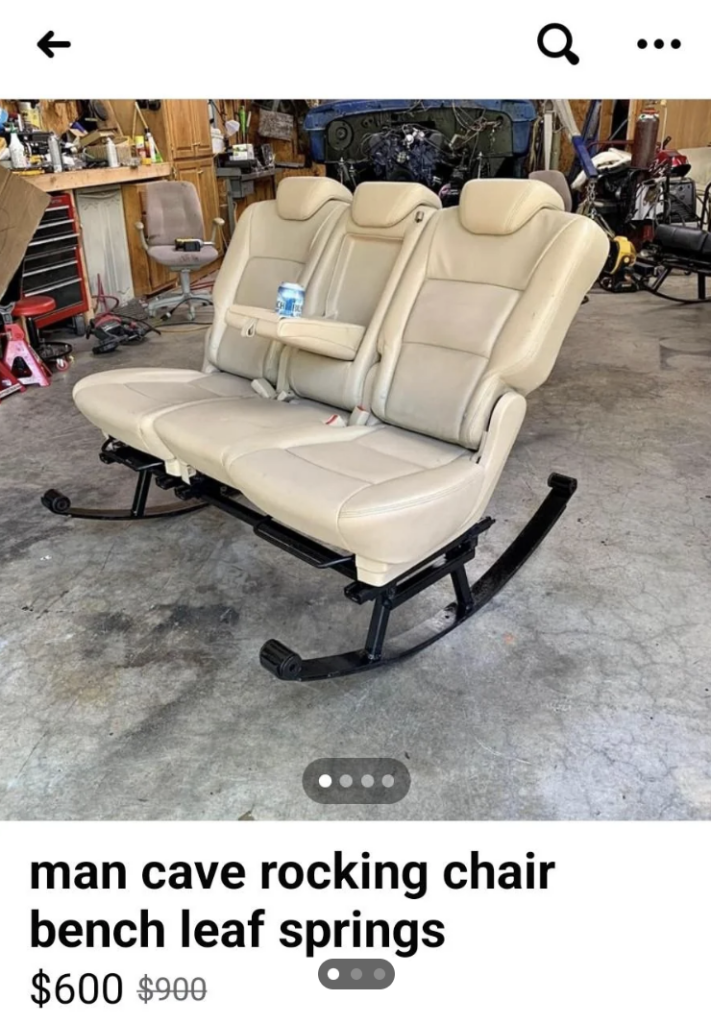 A rocking chair made from beige leather car seats, complete with seatbelts and adjustable armrests, is shown in a garage setting. The chair is priced at $600, marked down from $900. Various tools and workshop items are visible in the background.