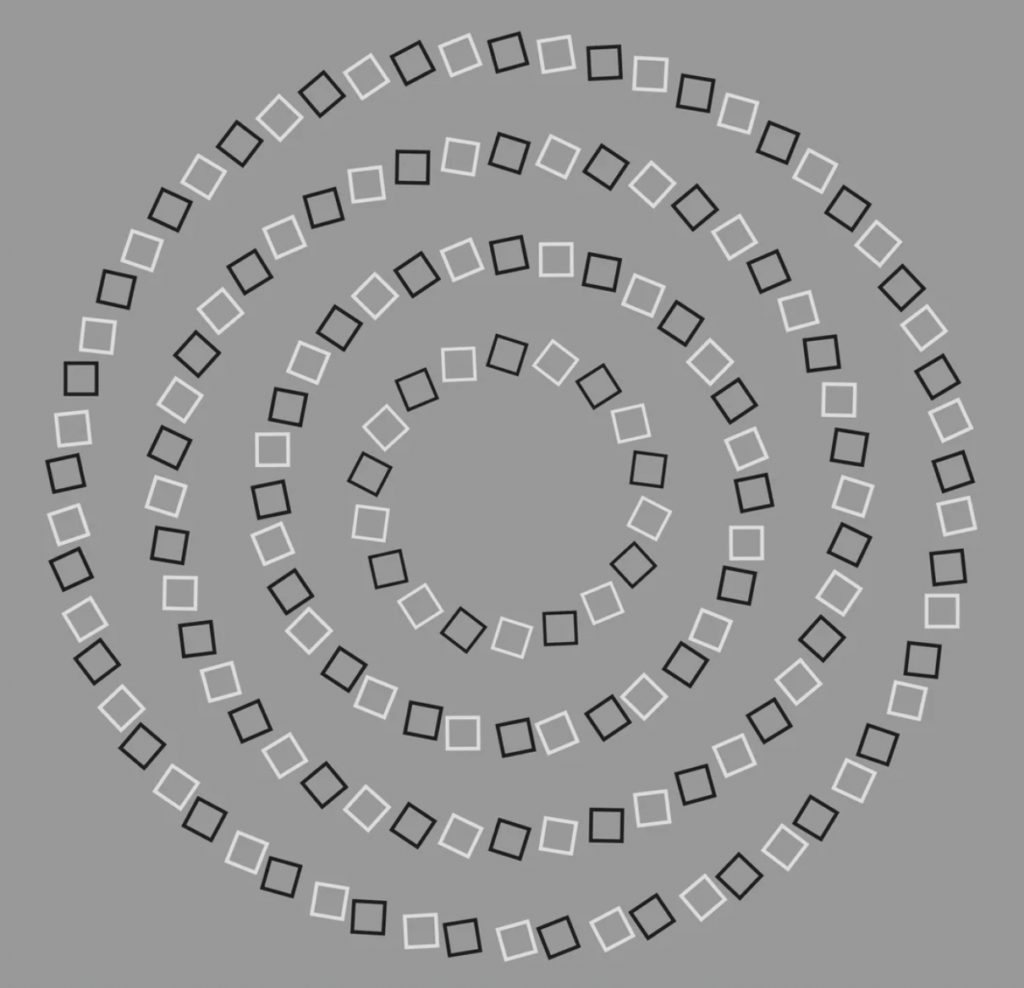 Geometric design with series of concentric spirals made up of alternating black and white squares, set against a gray background. The squares diminish in size as they approach the center of the spiral.