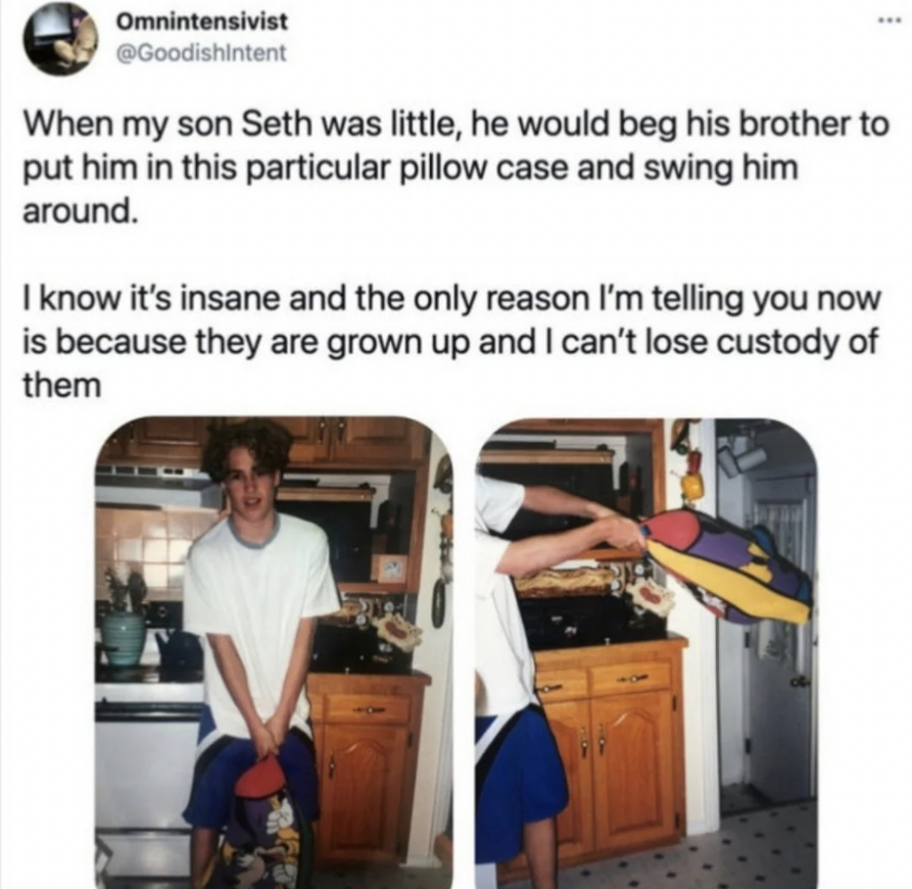 A man stands in a kitchen, holding a pillow case with a cartoon character on it. The caption above reads, "When my son Seth was little, he would beg his brother to put him in this particular pillow case and swing him around. I know it’s insane and the only reason I’m telling you now is because they are grown up and I can’t lose custody of them.