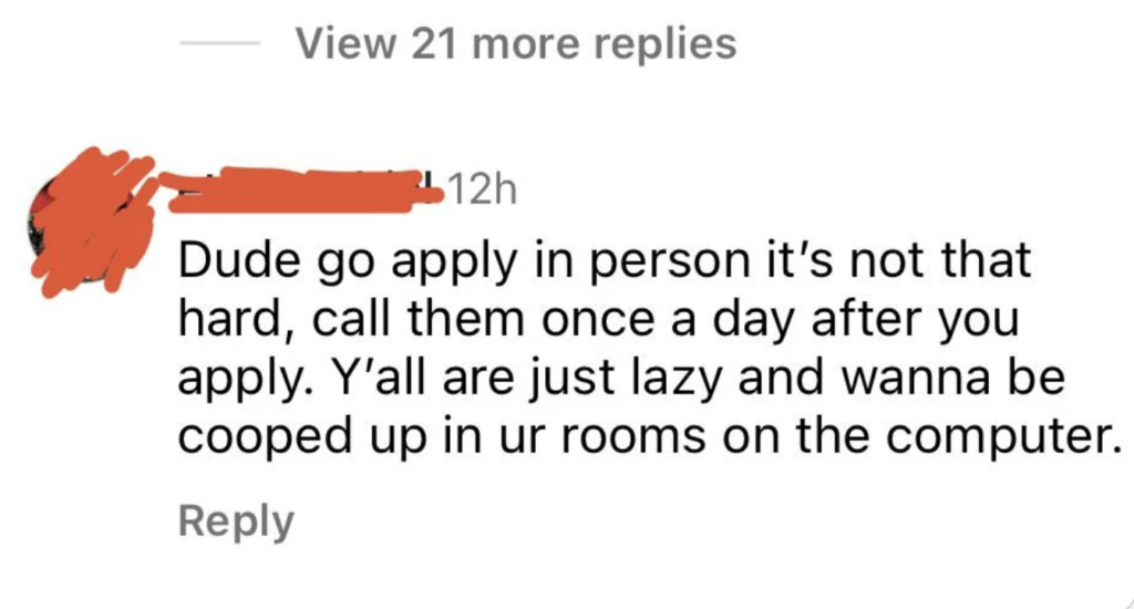 A social media comment with text overlay reading: "Dude go apply in person it's not that hard, call them once a day after you apply. Y'all are just lazy and wanna be cooped up in ur rooms on the computer." There are options to view more replies and to reply.