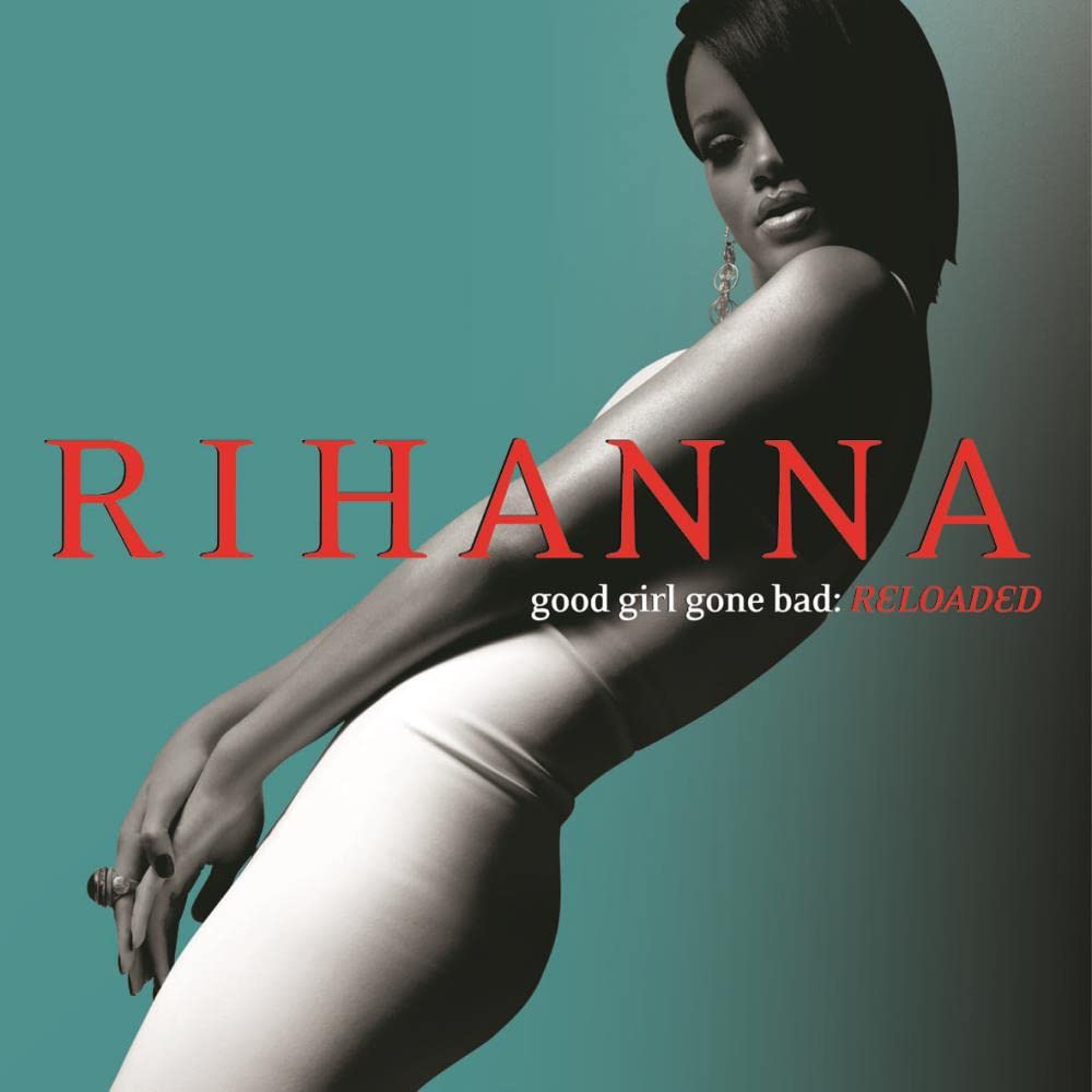 Cover of "Good Girl Gone Bad: Reloaded" by Rihanna. The image shows Rihanna posing against a turquoise background, wearing a white outfit, silver earrings, and a bracelet. The artist's name, Rihanna, is written in large red capital letters, with the album title beneath it in white.