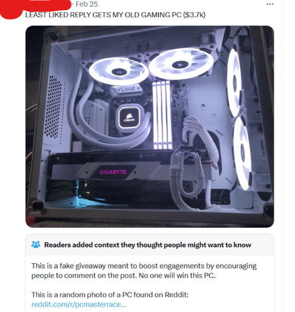 A tweet with an image of a gaming PC with text stating "LEAST LIKED REPLY GETS MY OLD GAMING PC ($3.7k)." The gaming PC features LED-lit components. Below the tweet is a reader-added context message explaining that the giveaway is fake to boost engagements.