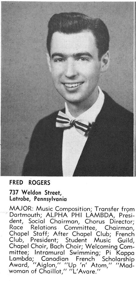 A black and white portrait of a young man, FRED ROGERS, dressed in a suit and bow tie. Beneath the image are biographical details, including education, fraternity, leadership roles, and accomplishments in areas like music composition, choir, swimming, and drama.