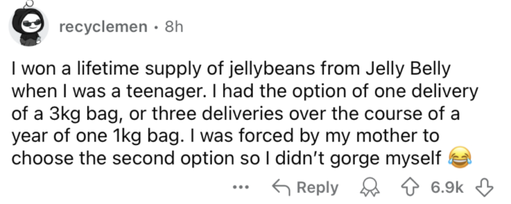 A social media post by user "recyclemen" with a profile picture of a person wearing sunglasses. The post describes winning a lifetime supply of jellybeans from Jelly Belly as a teenager. The user’s mother made them choose three 1kg deliveries over a year instead of one 3kg delivery to avoid overindulgence. There is a laughing emoji at the end of the text. The post has 6.9K likes and a comment.