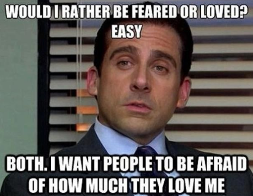 A man in a suit is sitting in an office, speaking seriously. Text above his head reads, "WOULD I RATHER BE FEARED OR LOVED? EASY." The text below reads, "BOTH. I WANT PEOPLE TO BE AFRAID OF HOW MUCH THEY LOVE ME.