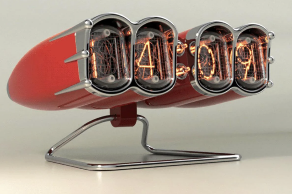 A red, retro-styled Nixie tube clock displays the time "14:03". It features four glowing tubes with numbers inside them, mounted on a minimalist metal stand. The design blends vintage aesthetics with modern technology.