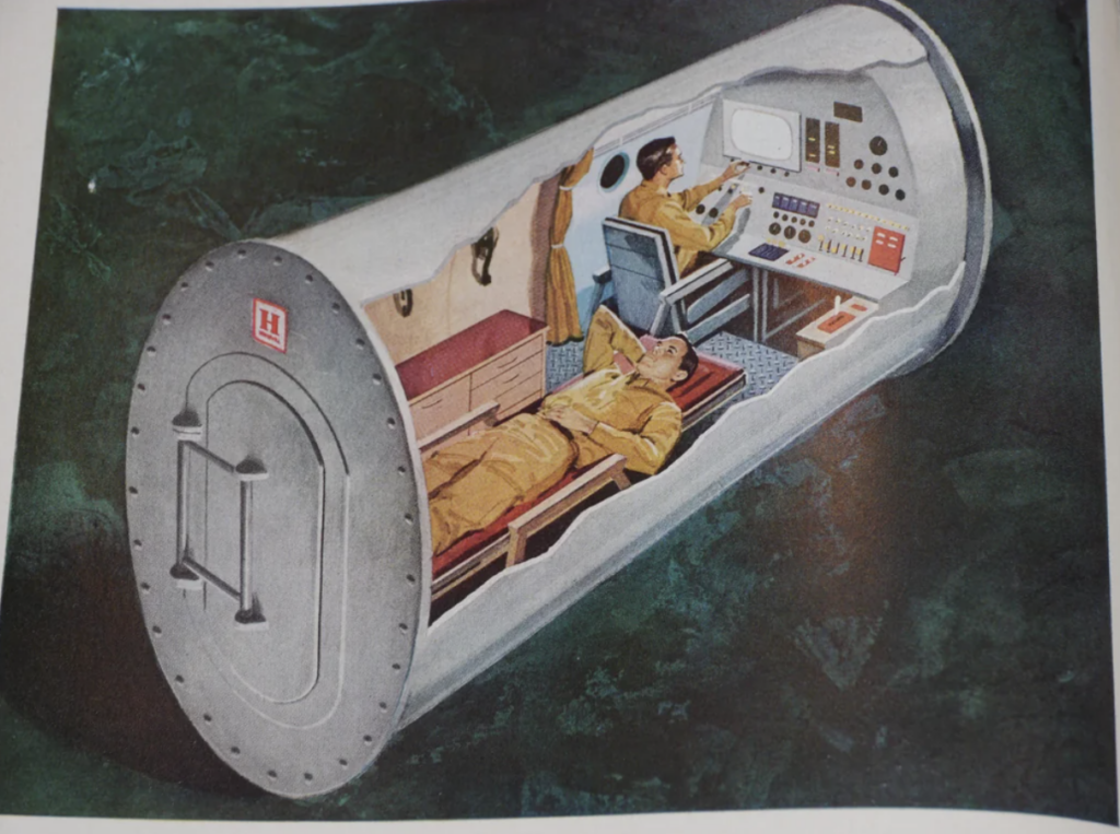 An illustration of a small, cylindrical spacecraft interior with two astronauts in yellow suits. One astronaut is lying down while the other operates instruments and equipment. The spacecraft has a simplified control panel and limited space for movement.