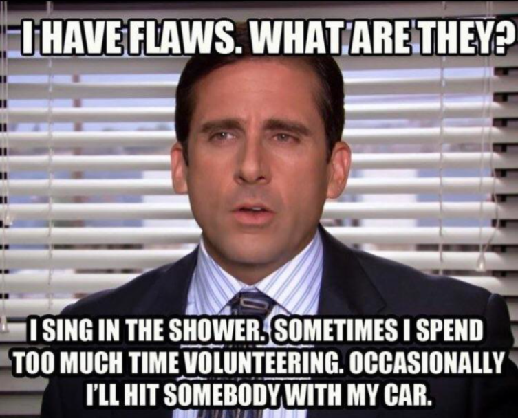 A man in a suit and tie, sitting in an office environment, with the quote: "I have flaws. What are they? I sing in the shower. Sometimes I spend too much time volunteering. Occasionally I'll hit somebody with my car.”