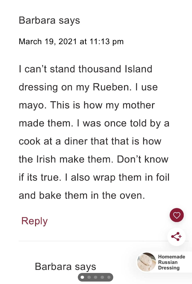 A screenshot of a comment section where a person named Barbara discusses their preference for mayonnaise over Thousand Island dressing on a Reuben sandwich, a recipe passed down from their mother. A notification icon is visible at the bottom right of the screen.