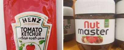 A side-by-side image showing a red package of Heinz Tomato Ketchup on the left and a jar of Nut Master spread on the right. The ketchup bag features Arabic text, while the Nut Master jar has a green cacao label.