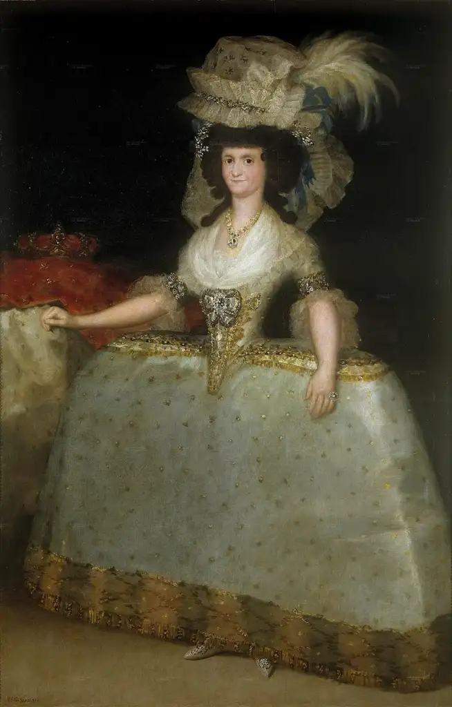 A woman in an elaborate 18th-century gown stands with a slight smile. Her dress is decorated with gold details and she wears a large, feathered hat. Her hand rests on a red cloth draped over a table. The background is dark, highlighting her outfit.