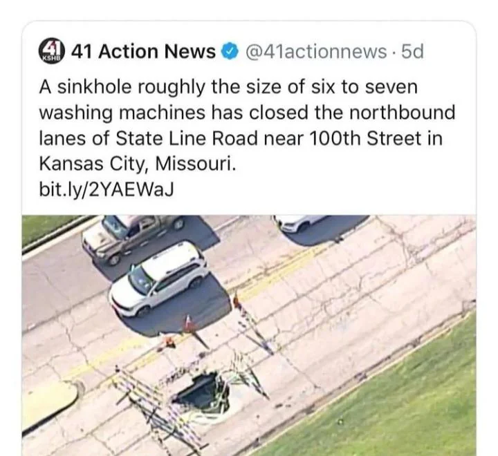 Aerial view shows a large sinkhole on a road, surrounded by traffic cones and two cars nearby. A tweet from a news station reports the sinkhole's size and location in Kansas City, Missouri.