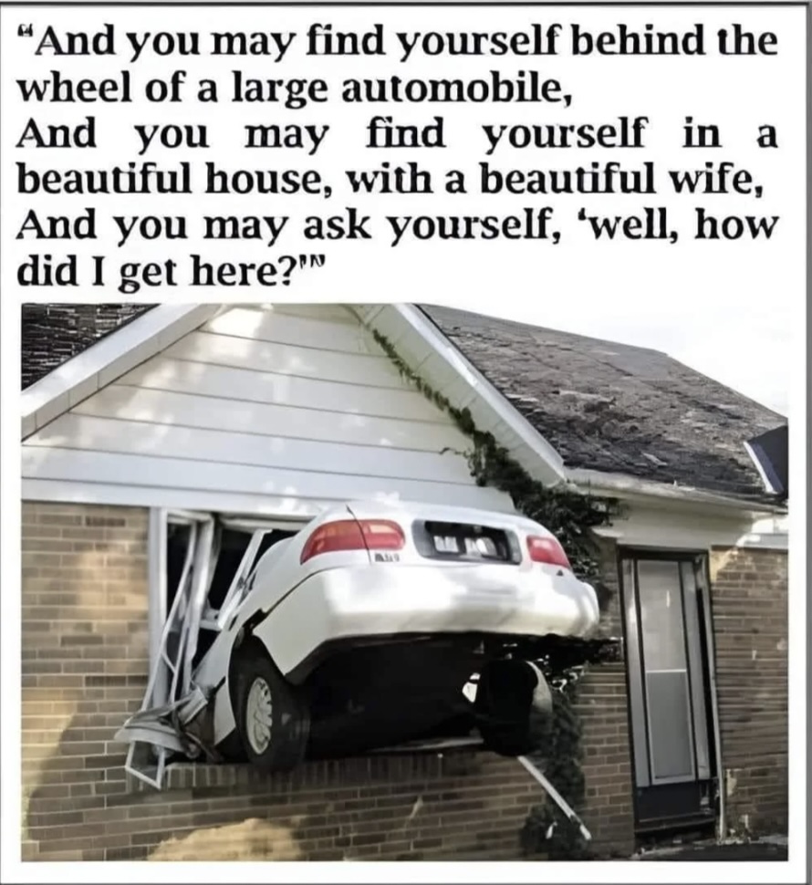 A car has crashed through the wall of a house, with its rear end sticking out. The text above the image is from a song, reflecting on finding oneself in unexpected situations.