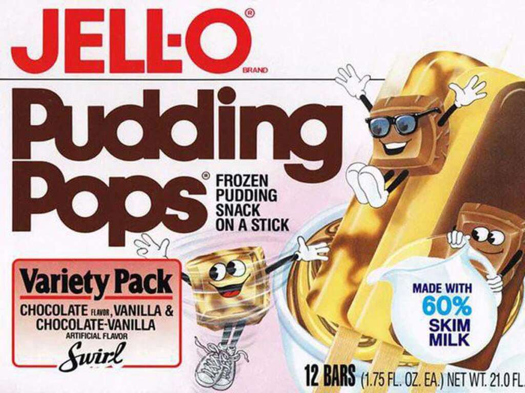 Packaging for Jell-O Pudding Pops, featuring cartoon pudding pops with faces and limbs. The variety pack includes chocolate, vanilla, and chocolate-vanilla swirl flavors. Made with 60% skim milk. Contains 12 bars, each 1.75 fl oz.