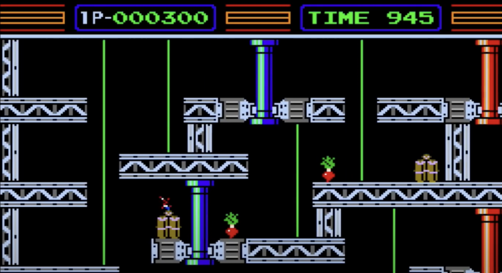 A retro video game screen shows a character navigating platforms and climbing ladders. The background is black, with metallic platforms and pipes. Carrot-like items and a wrapped gift are visible on the platforms. Score and time are displayed above.