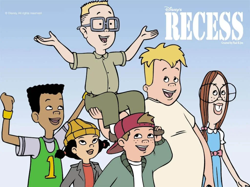 A group of animated children from the show "Recess" poses cheerfully against a blue sky. One child sits on another's shoulders, while the rest stand around smiling and waving.