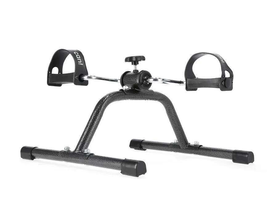 A compact, portable pedal exerciser with adjustable straps and a knob for resistance control, designed for low-impact workouts. The device has a sturdy metal frame and non-slip feet for stability.