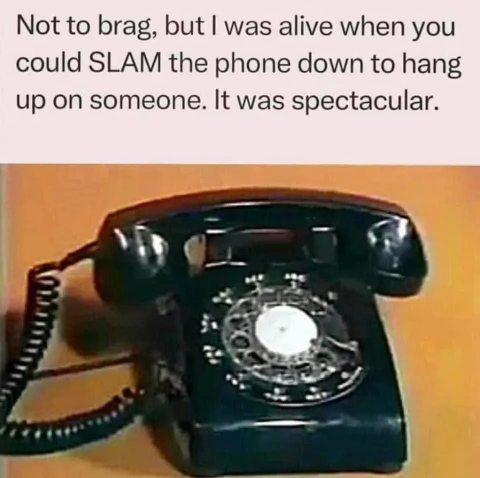 A vintage black rotary dial telephone is shown. The top text humorously notes the satisfaction of slamming down the receiver to end a call, emphasizing the tactile experience of using older phones.