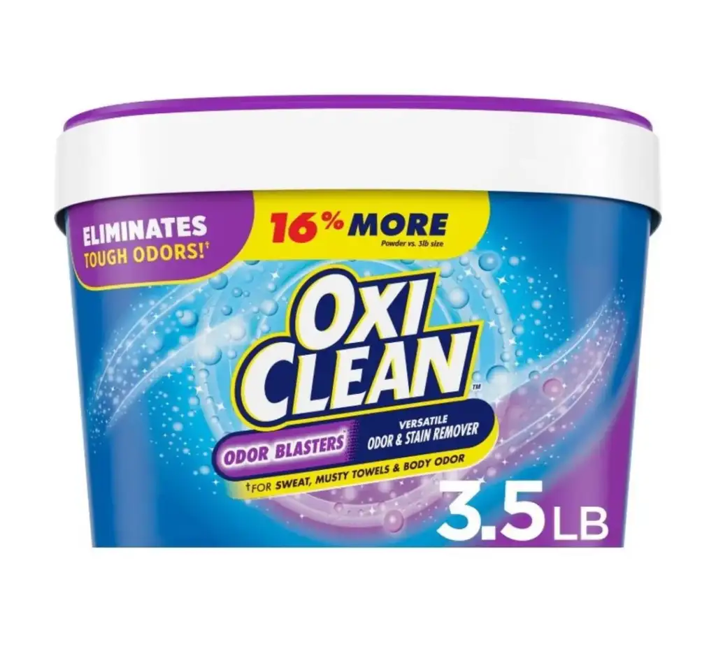 Container of OxiClean Odor Blasters. The label highlights that it eliminates tough odors and has 16% more product, weighing 3.5 lbs. The packaging is blue with purple accents.