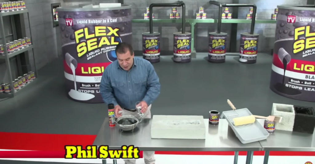 A person is demonstrating a product called Flex Seal Liquid in a room filled with large Flex Seal Liquid cans. They are pouring the liquid from a small container onto a tray. The name "Phil Swift" appears in yellow text.