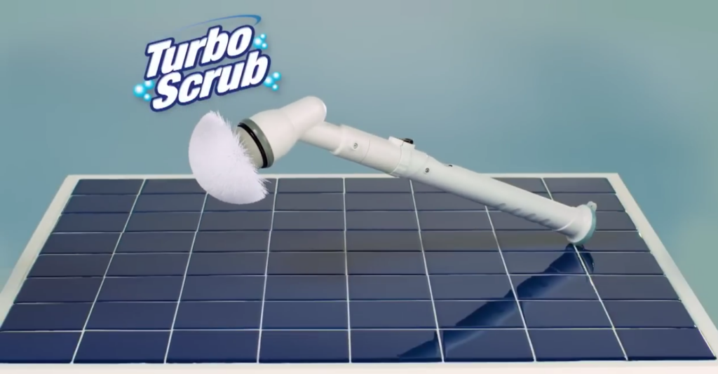 A Turbo Scrub cleaning brush is shown standing on solar panel tiles with a blue gradient background. The brush is angled diagonally, and the Turbo Scrub logo is visible in the upper left corner.