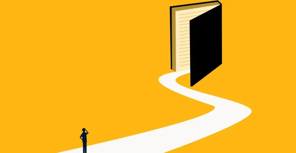 An illustration of a small person standing on a winding white path that leads to an enormous open book. The background is a solid orange color, highlighting the book's significance and the path's journey.