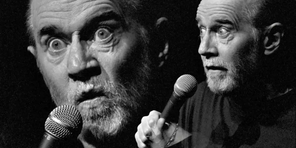 Black and white image of a bearded man holding a microphone, displaying two expressions: one wide-eyed and intense, and the other looking thoughtfully to the side.