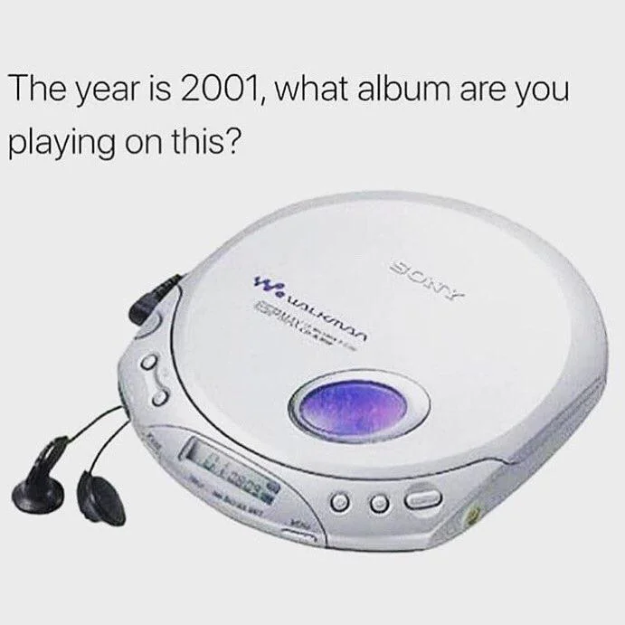 A Sony Walkman CD player with attached earbuds is shown. Text above reads, "The year is 2001, what album are you playing on this?