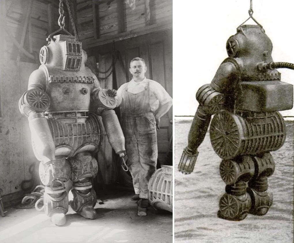 Black and white photos of an early diving suit. Left: Inventor stands beside a large, robotic-looking suit with circular joints and a helmet. Right: Close-up of the suit suspended, showing its cylindrical limbs and intricate design details.