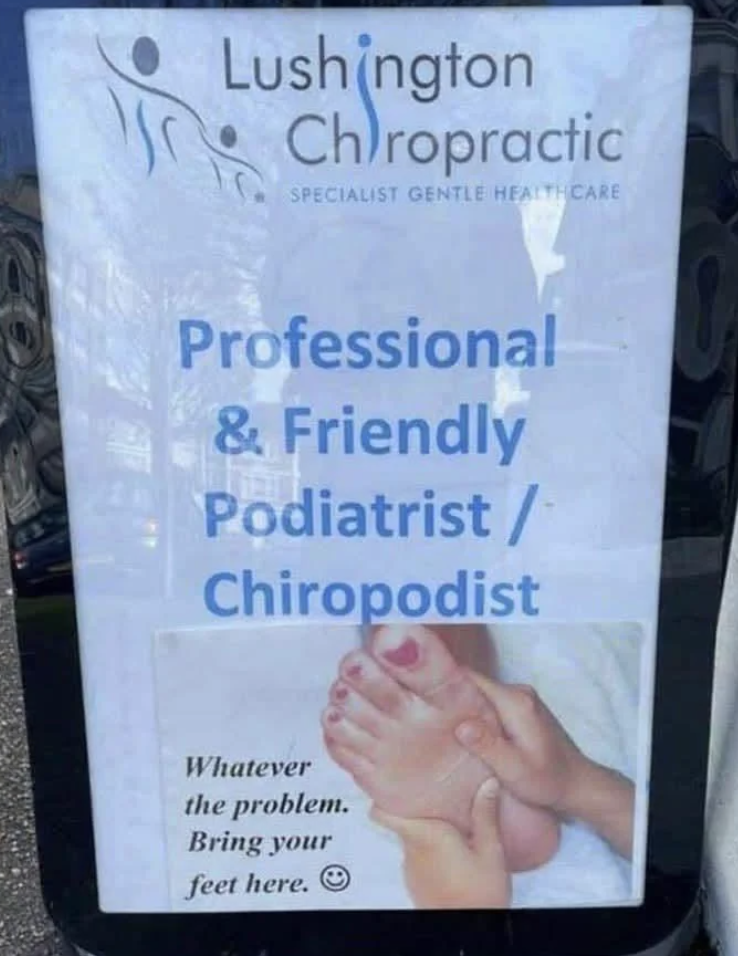 Sign for "Lushington Chiropractic" offering podiatry services. It reads, "Professional & Friendly Podiatrist / Chiropodist" with an image of hands massaging feet and text, "Whatever the problem. Bring your feet here.