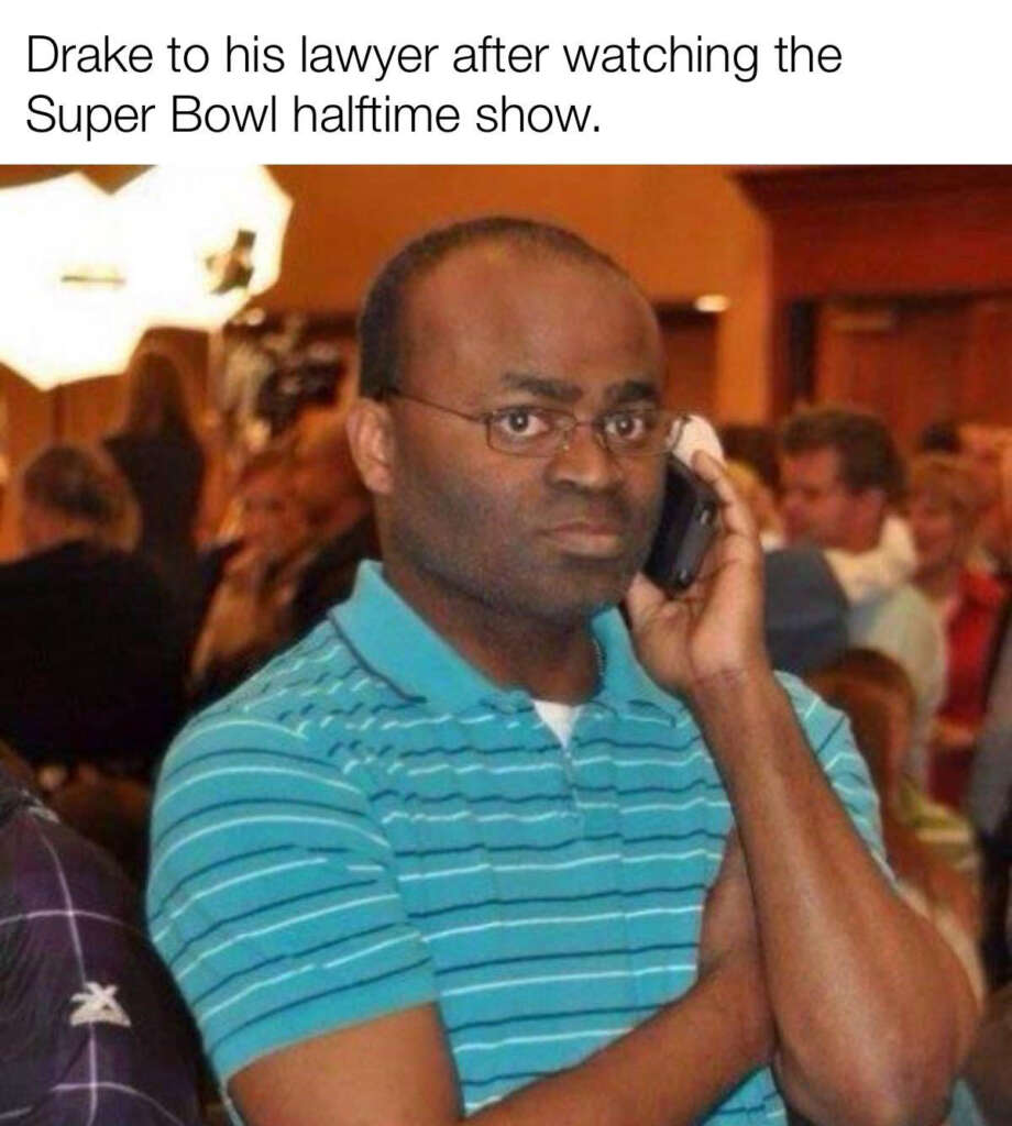 A man in a striped polo shirt crossed his arms while talking on a cell phone. The text above reads, "Drake to his lawyer after watching the Super Bowl halftime show." The background shows a blurry indoor setting with people.