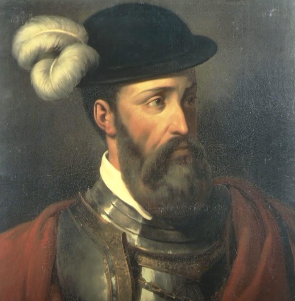 Portrait of a man in historical attire with a feathered black hat and armor. His gaze is to the side, with a serious expression. The background is dark, highlighting his features and traditional clothing.