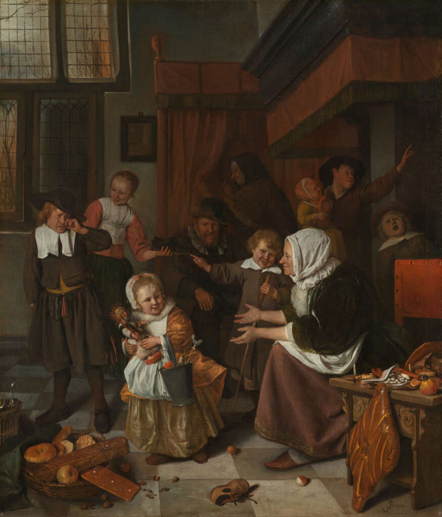 A lively 17th-century interior scene depicts a joyful family gathered around a fireplace. Children and adults engage in playful interactions. The room is adorned with period furniture, scattered food items, and a warm ambiance from the glowing fire.