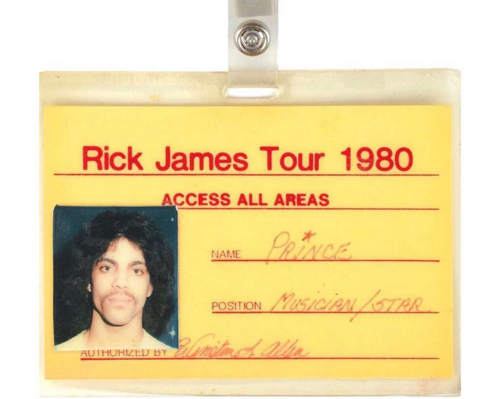 A vintage 1980 tour pass for Rick James. The pass is yellow with red text and includes a photo of an unidentified person. "Access All Areas" and "Musician/Guitar" are written on it.