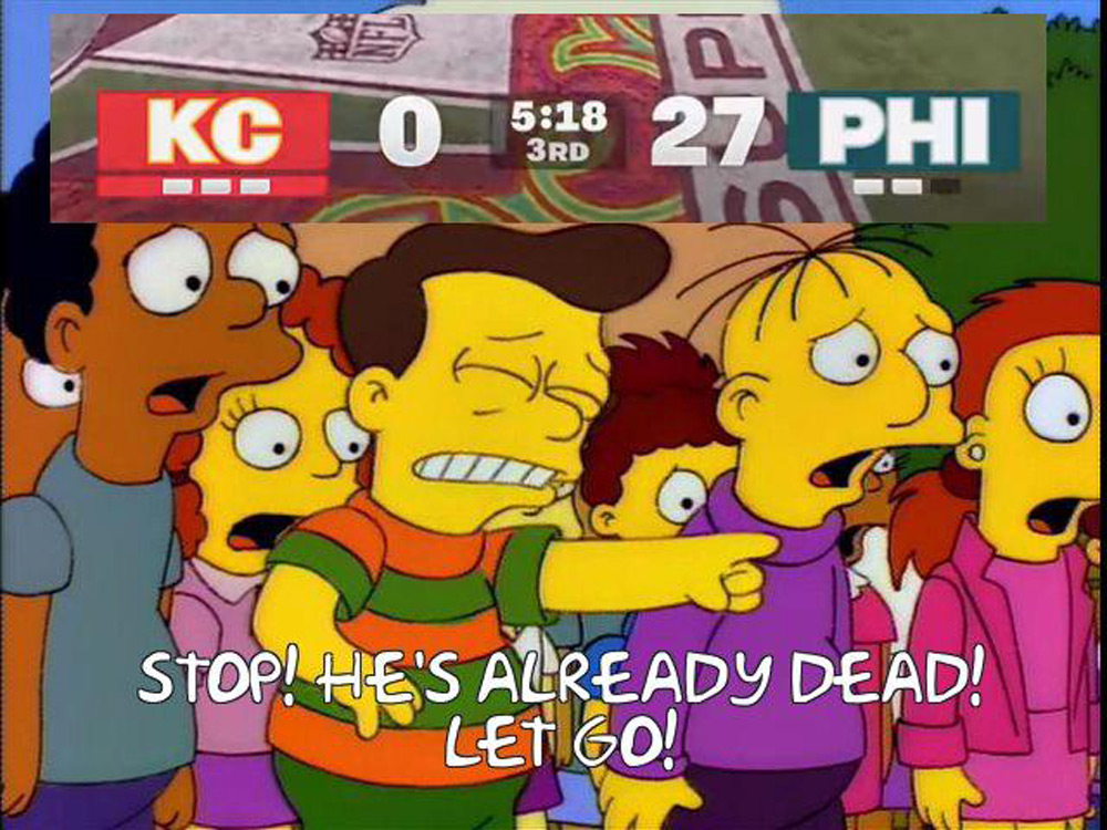 A cartoon scene shows a boy pointing and crying, surrounded by shocked children. An overlay shows a sports scoreboard: KC 0, PHI 27, with 5:18 left in the third quarter. Caption reads, "Stop! He's already dead! Let go!